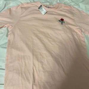 Pink shirt with rose